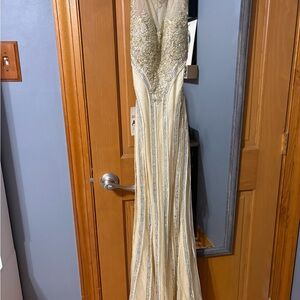 Elegant Beaded Gown with Gold and Silver Accents